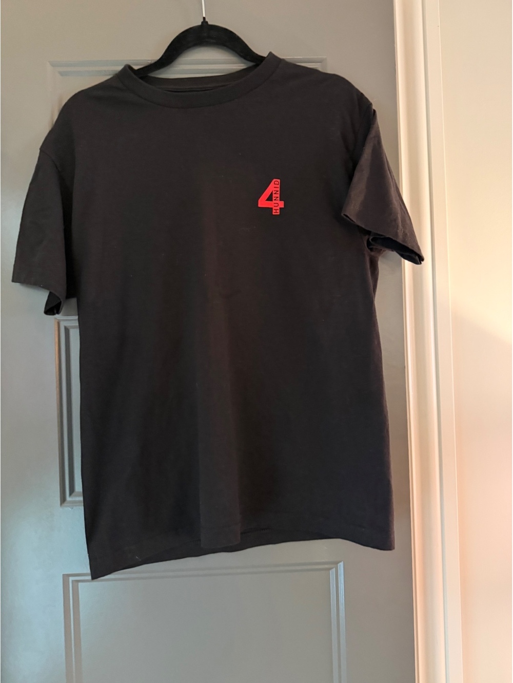 4Hunnid Black Graphic T-Shirt with Red Number 4 and Multicolor Text